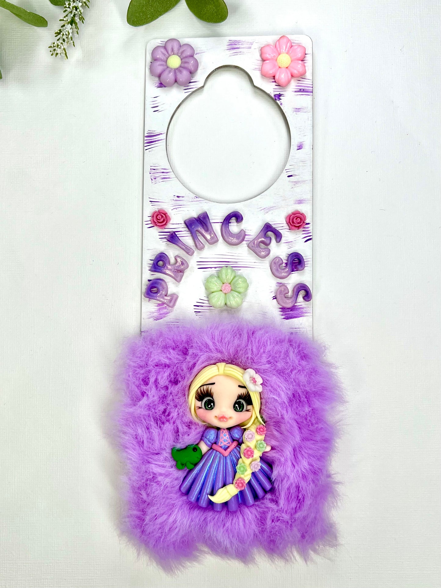 ✨ Transform any door into a fairytale entrance with our adorable handmade clay doll door hangers! Perfect for little princesses, these unique creations bring magic and charm to any room. 🌟💜 #HandmadeWithLove #ClayArt #PrincessDecor