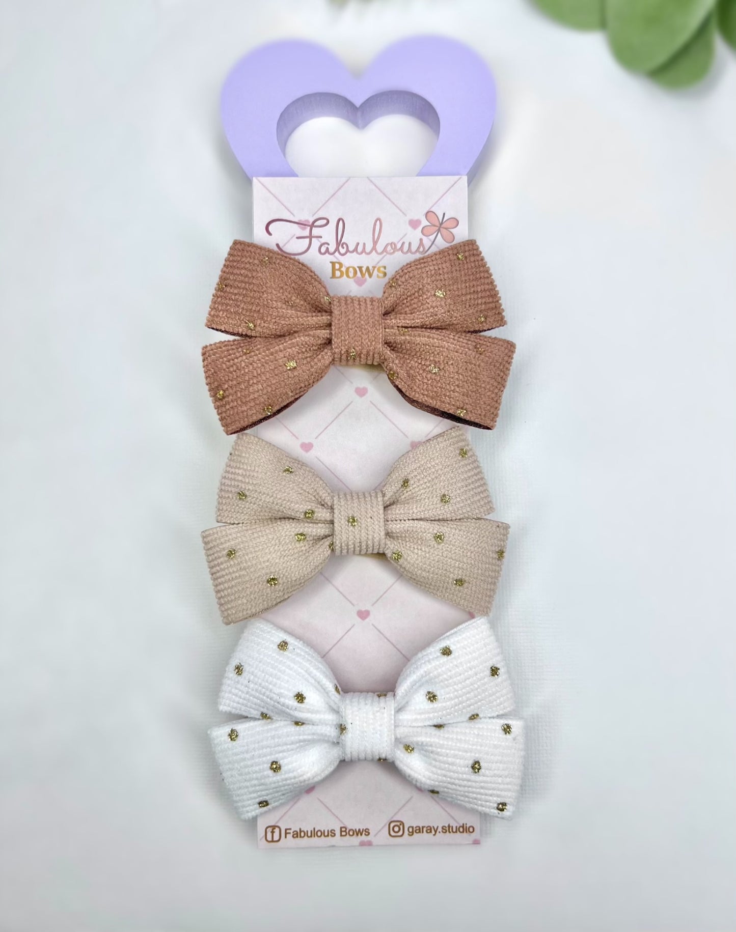 ✨ Sparkle and shine with our gold dusted bow collection! Perfectly versatile for any outfit or occasion.